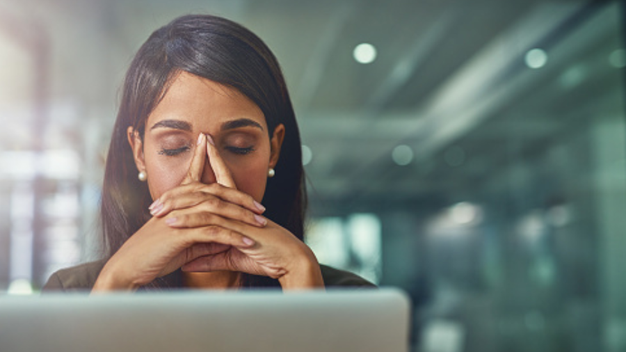 Frustrated professional overwhelmed by marketing technology decisions